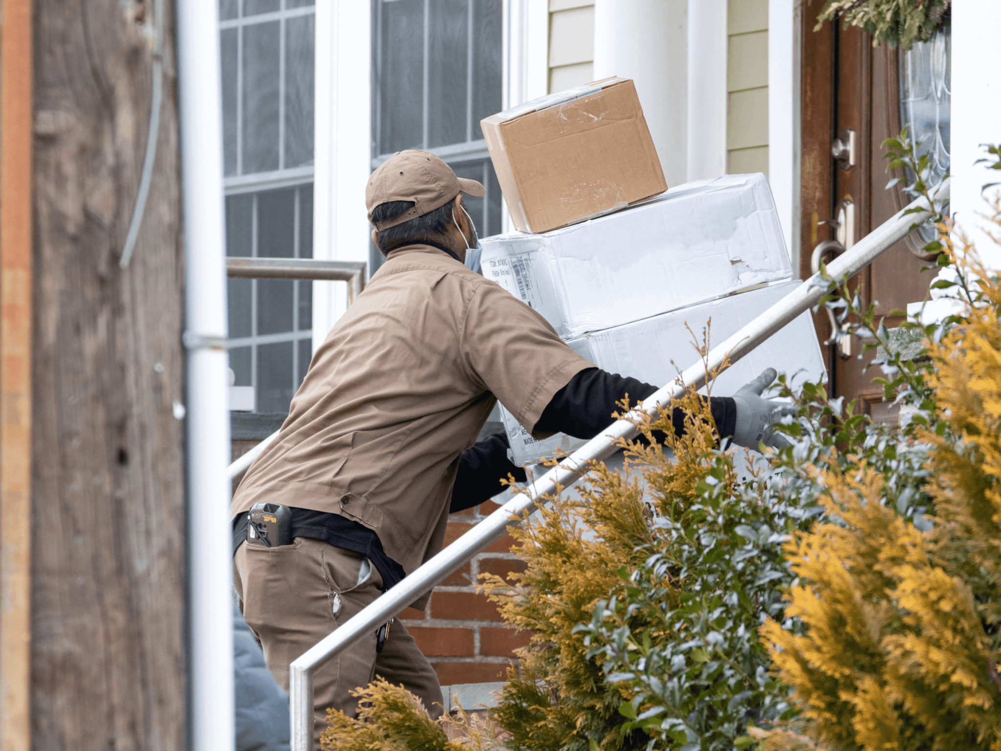 Man Delivering Large packages to home