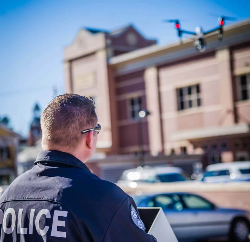 police officer flies drone